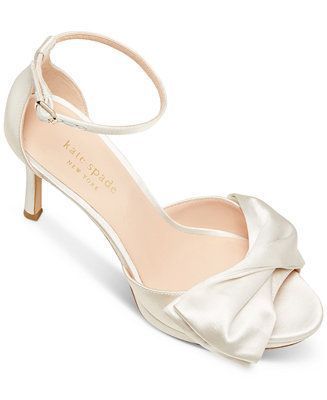 View More A satin bow and slender straps bring femininity to every step in the pretty Bridal Satin dress sandals from Kate Spade New York. 4\" stiletto heel Round-toe ankle strap dress sandals with adjustable buckle closure Satin bow detail at strap Satin Fabric upper; leather lining; leather sole Imported Web ID: 11558598 Bridal Satin Dress, Wedding Shoes Ideas, White Bridal Shoes, Bridal Shoes Low Heel, Satin Evening Dress, No Wedding, Blue Weddings, Jewel Badgley Mischka, Dresses Satin