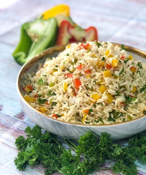 Bell Pepper & Parsley Rice Recipe is a super simple recipe of a yummilicious stir fried continental rice. Rice is cooked along with some roasted garlic, onions and a hint of rosemary.  The pre cooked rice is then tossed with pan roasted peppers and some fresh parsley. Great to be served with conti dishes or use it as am element for casseroles.  Serve Bell Pepper & Parsley Rice Recipe along with Herbed Vegetables In Roasted Bell Pepper Sauce Recipe or Roasted Bell Pepper Rice Recipe, Parsley Rice Recipe, Bell Pepper Sauce Recipe, Parsley Rice, Peppers And Rice, Bell Pepper Sauce, Herbed Rice, Ground Beef Breakfast, Cilantro Lime Rice Recipe