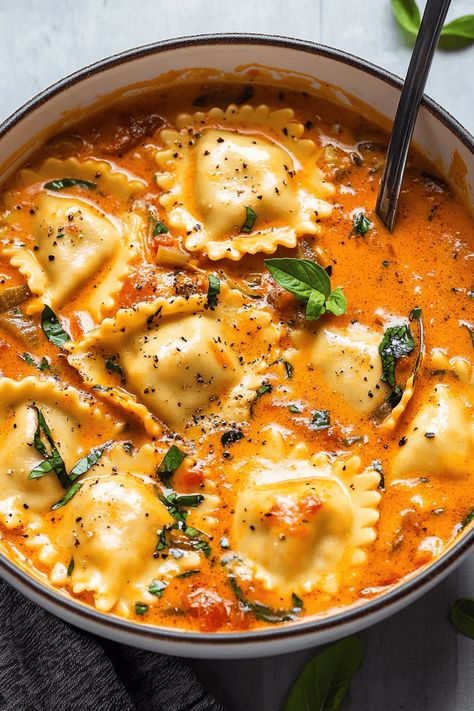 Creamy Ravioli Soup Ravioli In A Tomato Parmesan Broth, Creamy One Pot Ravioli Soup, Dutch Oven Ravioli, Soup With Cheese Ravioli, Soup Recipes With Ravioli, Creamy Tuscan Ravioli Soup, Creamy Ravioli Soup Recipe, Slow Cooker Ravioli Soup, Chicken Ravioli Soup Recipe