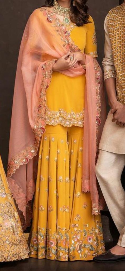 Haldi Ceremony Outfit Pakistani Style, Jaggo Outfit Punjabi Suit Yellow, Haldi Ceremony Outfit For Sister Yellow Kurti, Yellow And Pink Outfit Indian, Manjha Ceremony Dresses, Yellow And Pink Sharara, Trendy Haldi Outfits For Bride, Punjabi Haldi Ceremony Outfit, Haldi Ceremony Suit Design