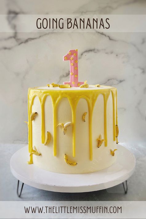 Banana themed cake for a delighful first birthday party. Vanilla Cake | Brown Sugar SMBC Filling | Salted Caramel Center | Vanilla SMBC Frosting | Hand-crafted Gumpaste Bananas & Cake Topper First Birthday Banana Theme, Banana Themed Cake, Banana Cake Design, Banana Theme Cake, Banana Theme Party, Banana First Birthday Party, Banana Birthday Cake, Banana Themed Birthday Party, Banana Birthday Party