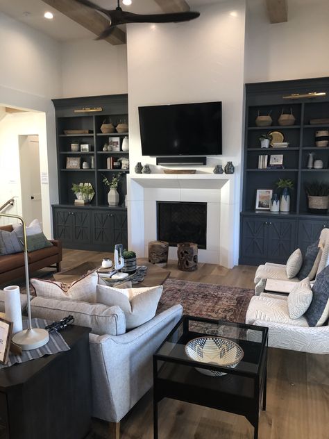 Utah Valley Parade of Homes 2018, Millhaven..   Go to this link for all paint colors:    https://www.favoritepaintcolorsblog.com/2018/07/modern-farmhouse-home-tour-utah-valley-parade-of-homes.html?utm_source=feedburner&utm_medium=email&utm_campaign=Feed%3A+FavoritePaintColors+%28Favorite+Paint+Colors%29 Painted Built Ins, Built In Around Fireplace, Built In Shelves Living Room, Living Room Built Ins, Fireplace Built Ins, Family Room Ideas, Transitional Living Rooms, Neutral Living Room, Fireplace Ideas