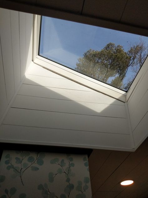 Trim Around Skylight, Skylight In Stairwell, Shiplap Ceiling With Skylights, Skylight Trim Ideas, Skylight Entryway, Cottage Skylight, Skylights Ideas Ceilings, Hallway Skylight, Diy Skylight