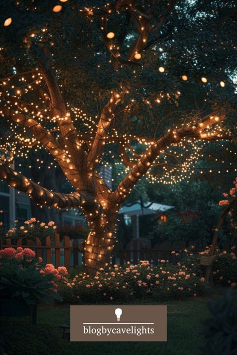 Elevate your garden design with stunning garden tree lights 🌿. Our step-by-step guide will help you get it right! Read the full article now! Wedding Trees With Lights, Christmas Lights Hanging From Trees, Garden Tree Lights, Christmas Lights Outside Trees, Outdoor Christmas Lights Tree, Christmas Garden Decorations Outdoor, Fairy Lights On Trees, Twinkle Lights Backyard, Lights On Trees Outside