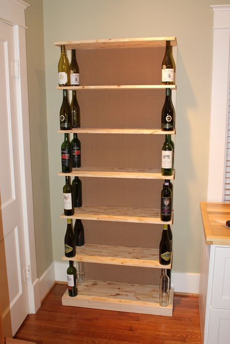 Wine Bottle Bookshelf via The FABULOUS Blog of Miss Ginger Grant! Torches Tiki, Wine Bottle Project, Diy Wine Bottle, Frat House, Bottle Diy Crafts, Empty Wine Bottles, Wine Bottle Candles, Wood Bookshelves, Wine Bottle Diy Crafts