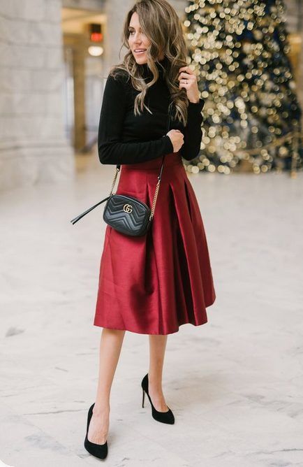 Midi Red Satin Skirt with Long-Sleeved Black Shirt | Get classy and formal holiday party dresses, chic Christmas skirts and Xmas holiday pants with sequin sparkle. Perfect for winter and the 2020 holiday season. #christmaspartyoutfits #christmasoutfitideas #classychristmasoutfits #holidayoutfits Christmas Outfit Ideas For Women Classy, Classy Christmas Party, Christmas Dinner Outfit, Cozy Christmas Outfit, Lunch Outfit, Cute Christmas Outfits, Trendy Christmas Outfits, Christmas Skirt, Christmas Party Outfit