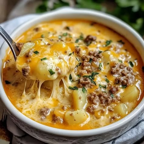 Cheesy Hamburger Potato Soup recipe Hamburger Cheesy Potato Soup, Slow Cooker Cheese Burger Soup, Bacon Cheeseburger Potato Soup Instant Pot, Cheesy Beef Soup, Hamburger Potato Cheese Soup, Cheesy Cowboy Soup 12 Tomatoes, Cheesy Potato Hamburger Soup, Cheesy Hamburger Potato Soup Recipe, Hashbrown Dinner Ideas