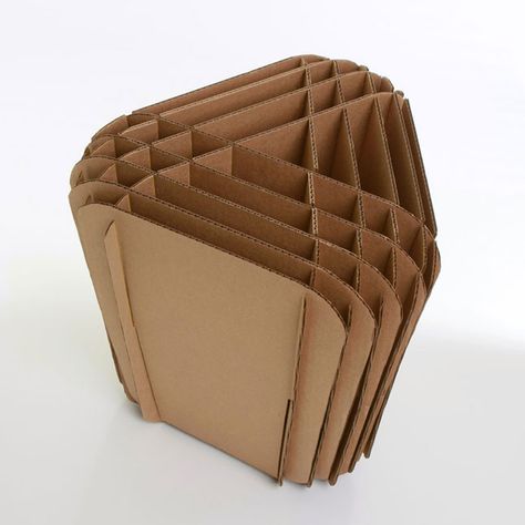 21 Pieces of Furniture Made From Cardboard (Yes, Seriously!) via Brit + Co. Cardboard Stool, Dolls Victorian, Barbie Products, Dolls Miniature, Cardboard Chair, Art Newspaper, Cardboard Design, Paper Furniture, Newspaper Basket