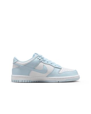 Designed for basketball but adopted by skaters, the Nike Dunk Low helped define sneaker culture. Now this mid-'80s icon is an easy score for your closet. With ankle padding and durable rubber traction, these are a slam dunk whether you're learning to skate or getting ready for school. Shown: White/Glacier Blue Style: FB9109-105 Nike Light Blue Shoes, Nike Dunks Light Blue, Nike Jordan Low Blue, Preppy Nike Dunks, Nike Shoes Cute, Nike Dunks Kids, Light Blue Dunks, Preppy Nike Shoes