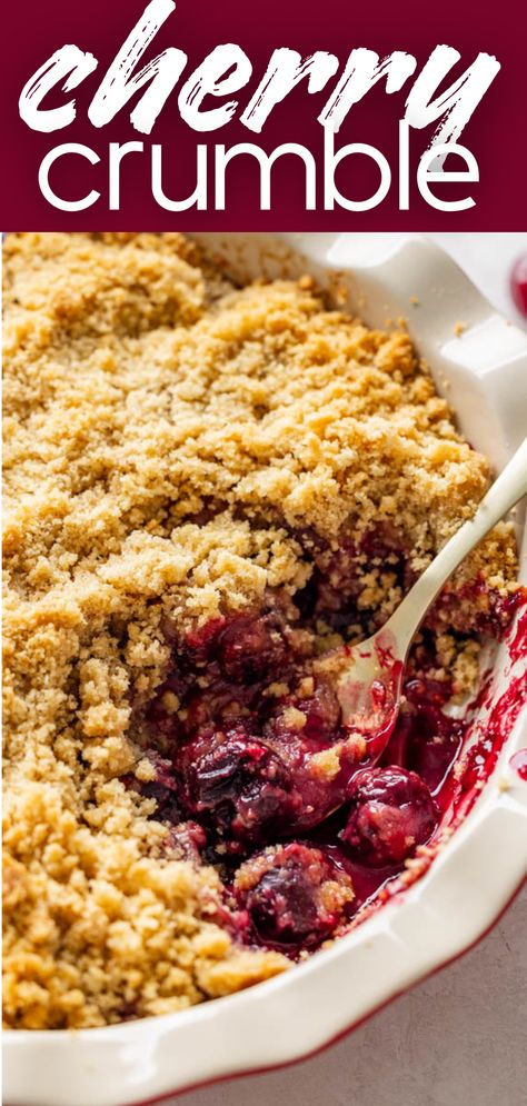 A close up view of a pan of cherry crumble with a spoon sticking out. Cherry Cobbler Fresh Cherries, Cherry Crisp Recipe With Canned Cherries, Fruit Crumble Topping, Berry Crisp Recipe Crumble Topping, Cherry Crisp Recipe With Frozen Cherries, Cherry Crumble Pie Recipe, Cherry Crumble Cake, Best Cherry Cobbler Recipe, Cherry Crisp With Frozen Cherries