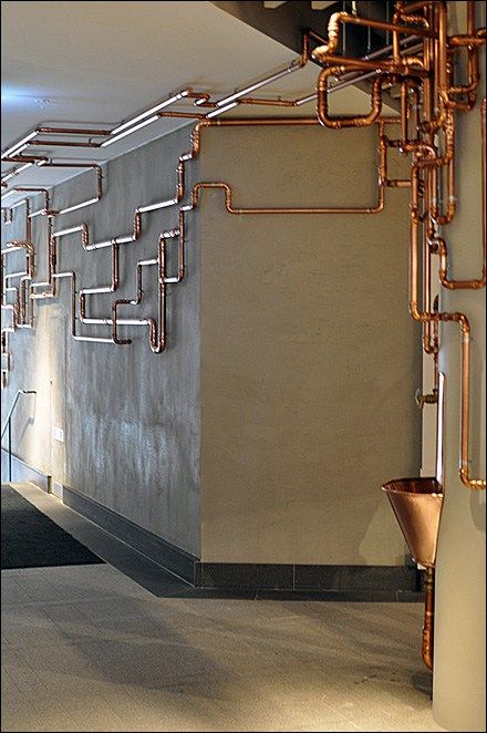 As customer amenity this Copper Water Fountain would catch the eye, even without the runaway copper piping. I’m sure the… Industrial Hallway, Luminaria Diy, Modern Industrial Interior, Copper Pipes, Vintage Industrial Style, Industrial Design Furniture, Industrial Bedroom, Vintage Industrial Furniture, Industrial Interior Design