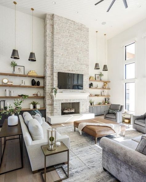 Home Decor And Interior Design on Instagram: "So many different views of this perfect Great Room. If the kitchen is the heart of the home, then this Great Room is the center of the home. - - Everything branched off this one space. This fireplace design has so many different details to notice. Take some time and notice the layers of texture between the precast material and the stone, with the sides done in a painted brick. Also, notice the levels of how these were layered on top of each other. T Fireplace With Cabinets, Modern Apartment Design, Fireplace Shelves, Open Plan Kitchen Living Room, Fireplace Built Ins, Painted Brick, Southern Home, Design Your Home, Living Room With Fireplace