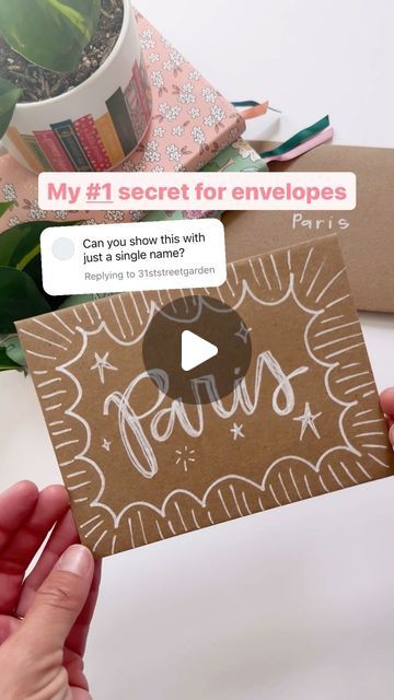 Pippi Post | Bookish Merch ✨ on Instagram: "Want my number one tip for envelopes? 

If you’re not worried about an address or stamp, always ✨TAKE UP MORE SPACE! ✨

This will make your envelope POP! 

To get this look:

✨ Start with a brown kraft envelope and card (so many to choose from in my shop!) 

✨ Try to take up as much space as possible! Since I’m just writing one name, I added a border!

✨ Thicken the letters! I’m using a medium sized pen tip here, but I wanted to letters to stand out so I added extra strokes.

✨ Finish by adding embellishments or doodles in the negative space around the name!

Comment LINK below and I’ll send you the supplies! 👇

#writelikepippi #enevelopeaddressing #handwritingtips #handwritingideas #pippipost #stationeryaddict" Cute Ways To Decorate Envelopes, Decorate Envelope Ideas, Decorate Envelope, Card Envelope Ideas, Decorated Envelopes, Bookish Merch, Envelope Design, Addressing Envelopes, Crafts Cards