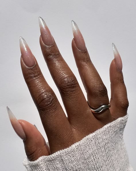 Stills of that glitter set 🤩✨ Created using @lovelecente Show Stopper Loose Glitter and Top Coat on @apresnailofficial Natural Stiletto Long Tips and @dndgel.europe Glass Peach gel #bygabrielleeva #nailinspo #nailart #nailinspo #longnails #bridalnails #glitternails #ombrenails #clearnails #gelxnails Glaze Ombre Nails, Stiletto Silver Nails, Clear Stiletto Nails Design, Natural Stilletos Nails, Stiletto Nails Natural, Opalescent Nails, Natural Stiletto Nails, Acrylic Black Nails, Ethereal Nails