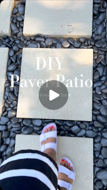 Stephanie Boyer | Interior Decor | Interior Design | DIY on Instagram: "The patio is coming along! I partnered with @loweshomeimprovement to transform my boring backyard. Comment links for a list of all the products I used to build the patio! Stay tuned to see the nexts steps✨✨

The pavers are linked in my bio #affiliatelink #lowespartner #lowesfinds #diy #patio #diyprojects #diypatio #pavers #paverstone #lowes #outdoorproject #patiodesign" Cheap Concrete Patio Ideas, Diy Pavers Over Concrete Patio, Backyard Gravel Fire Pit Ideas, Paver And Stone Patio, Paver Walkway With Grass In Between, Rock And Paver Patio Ideas, Cement Patio Ideas Diy, River Stone Patio, Outdoor Patio Paver Designs