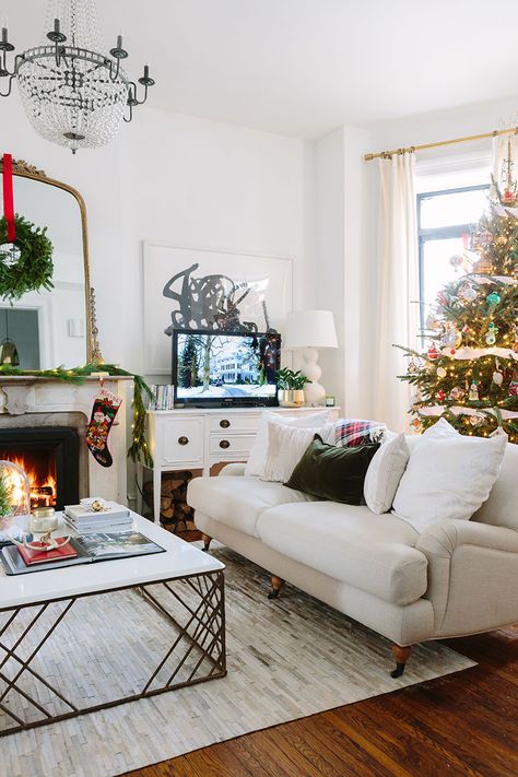 The Everygirl Cofounder Alaina Kaczmarski’s Greystone Holiday Tour | The Everygirl Alaina Kaczmarski, Rosa Sofa, Winter Living Room Decor, Winter Living Room, Living Space Decor, Holiday Home Tour, Decorating For Christmas, Celebrity Homes, Family Room Design