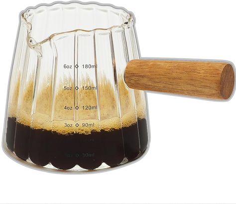 The wooden handle and ribbed glass design give this espresso measuring cup an elegant look/feel.
High Temperature Resistant: This espresso shot glass uses borosilicate glass, which means it can withstand higher temperatures and this espresso cup is microwave-safe. Espresso Accessories, Home Must Haves, Shot Cups, Glass Measuring Cup, Espresso Shot, Frothing Milk, Glass Coffee Mugs, Measuring Tools, Heat Resistant Glass