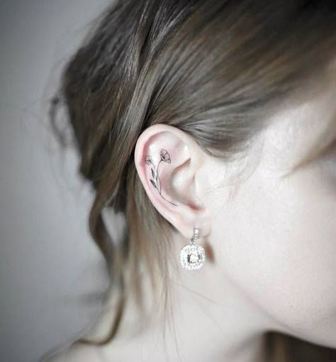 Tiny flower tattoo on the right ear. Flower Ear Tattoo, Flower Tattoo Ear, Cartilage Tattoo, Tattoos Behind The Ear, Inner Ear Tattoo, Ear Tats, Tiny Flower Tattoos, Flower Spine Tattoos, Flower Tattoo Drawings