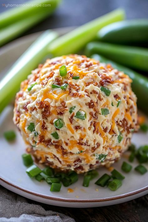 Jalapeño Popper Cheese Ball is a creamy blend of cream cheese, sour cream, jalapeños, and cheddar, coated with green onions, pecans, and extra cheddar. A party favorite! Cheese Ball Jalapeno Popper, Jalapeño Cheddar Cheese Ball, Garlic Cheeseball Recipes, Cheese Ball Gift Ideas, Cajun Cheese Ball, Spicy Cheeseball Recipes, Football Platter Ideas, Jalapeno Popper Cheeseball, Jalapeno Cheese Ball Recipes