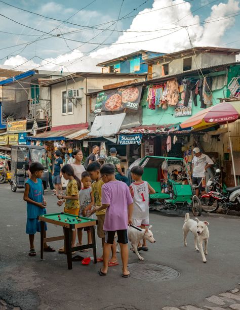 Colorful street photography of children playing billiards in Intramuros, Manila, capturing Filipino culture and street life. A vibrant snapshot of the Philippines aesthetic, perfect for travel photography enthusiasts. Intramuros Photography, Digos City, Philippine Street, Philippines Street, Filipino Aesthetic, Intramuros Manila, Philippines Aesthetic, Urban Photography Portrait, Leica Photography