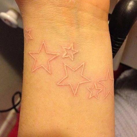 White ink stars White Simple Tattoo, White Ink Micro Tattoo, White Tattoo Ideas Female, White Ink Tattoo On Tan Skin, White Ink Star Tattoo, White Tatoos Ideas, Tattoo Ideas White Ink, White Tattoos On Black Skin, White Ink Hand Tattoo