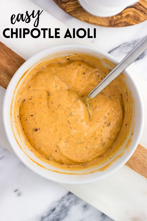 This chipotle aioli is just the sauce to jazz up sandwiches and burgers, dip vegetables or fries, and more. Made with a shortcut with mayonnaise as a base, it’s easy to adjust the spice level to your liking. Chipotle Aoli Recipe, Chipotle Aioli Recipe, Homemade Aioli, Roasted Garlic Hummus, Aioli Sauce, Chipotle Aioli, Aioli Recipe, Sauces And Dips, Chipotle Sauce