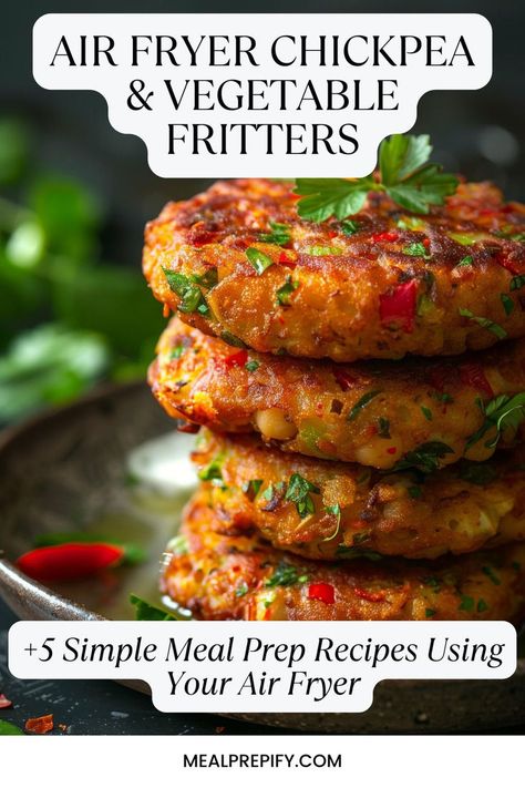 Crispy chickpea and vegetable fritters garnished with fresh herbs, a healthy choice for meal prep recipes using your air fryer. Air Fryer Recipes Chickpeas, Healthy Meal Prep Air Fryer Recipes, Chickpea Fritters Air Fryer, Air Fryer Vegetables Recipes, Healthy Air Fryer Lunch Ideas, Air Fryer Fritters, Air Fryer Meals Vegetarian, Air Fryer Recipes Protein, Airfryer Vegetables Recipes