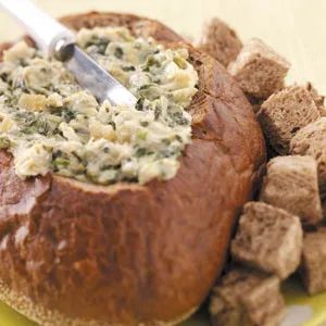 Artichoke Spinach Dip in a Bread Bowl Recipe: How to Make It Dip For Bread Bowl, Artichoke Dip In Bread Bowl, Spinach Dip In Bread Bowl, Dip In Bread Bowl, Spinach Cob Loaf, Hot Dip Recipes, Mozzarella Bread, Dip For Bread, Lord Of The Rings Party