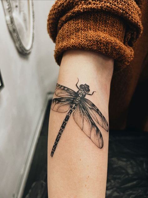 Wrist Tattoos Dragonfly, Dragonfly In Amber Tattoo, Moth Butterfly Dragonfly Tattoo, Realistic Dragonfly Tattoo Design, Dragonfly Tattoo Design For Men, Fine Line Dragon Fly Tattoos, Dragonfly Throat Tattoo, Black And Grey Dragonfly Tattoo, Dark Dragonfly Tattoo