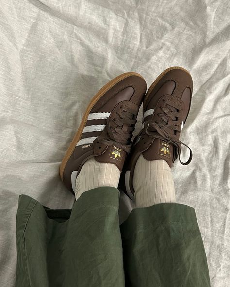 Embracing fall vibes! 🍁 What’s your pick this season: Samba or Handball Spezial? Brown Adidas Samba Outfit, Adidas Brown Shoes, Trend Sneakers 2024 Woman, Adidas Spezial Brown, Adidas Samba Brown, Brown Sneakers Outfit Women's, Brown Adidas Shoes, Adidas For Women, Sambas Adidas Women Outfit