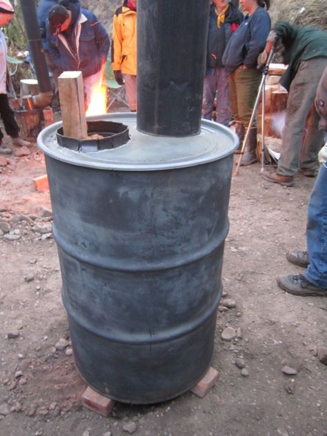 one of the simplest designs and one of the most efficient burning stove ever made... Sauna Project, Rocket Stove Mass Heater, Shop Heater, Burn Barrel, Barrel Fire Pit, Barrel Stove, Diy Heater, Rocket Mass Heater, Diy Wood Stove