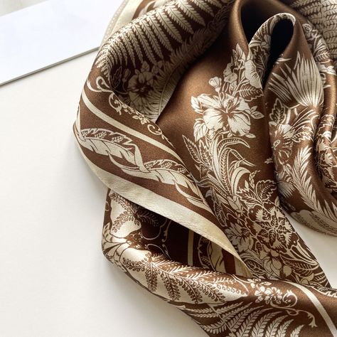 Effortlessly elevate your summer look with our bestseller silk bandana scarves! Versatile, chic, and comfortable, it's the perfect accessory to add a touch of sophistication and elegance to your everyday outfit. #LuluLaneUK #giftforherideas #ComfortInStyle #LittleLuxuries #ootdinspo #SilkLove #effortlesslychic #neckchief #womensneckwear #bandanastyle #parisianstyle #accessoryoftheday #datenightoutfit #scarfstyle #SophisticatedStyle #shoplocaluk Brown Silk Scarf, Silk Hair Scarf, Scarf Photography, Small Silk Scarf, Luxury Silk Scarves, Pattern Weights, Silk Scarf Hair, Large Silk Scarf, Magical Accessories