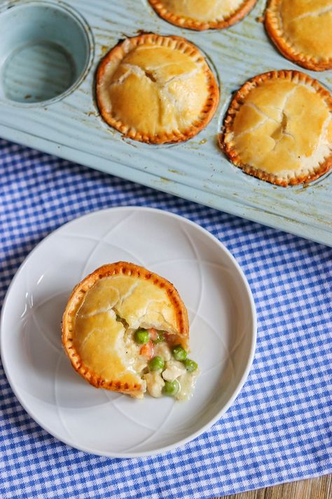 I'm sharing something different for Pi Day: individual pot pies in a muffin tin! These rich and creamy mini chicken pies are SO delicious, and it's easier than you might think to make mini chicken pot pies with pie crust using pre-made dough. Click or visit FabEveryday.com for the full muffin tin chicken pot pie recipe and tips for making chicken pot pies in muffin tins. Once you try these mini pot pies with pie crust, this will be the only muffin tin pot pies recipe that you'll ever need. Chicken Pot Pie Tarts, Cupcake Chicken Pot Pie, Chicken Pot Pie Pockets Easy, Chicken Pot Pie Pie Crust Recipe, Miniature Chicken Pot Pies, Individual Savory Pies, Chicken Pot Pie In Muffin Pan, Dessert In Muffin Tin, Muffin Tin Chicken Pot Pies