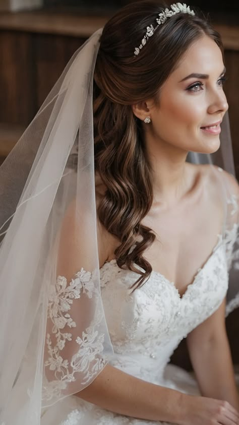 Discover stunning wedding hairstyles with veil ideas in this comprehensive guide From vintage to updos tiaras crowns buns Korean styles curly hair simple ponytails bobs long and short looks - find the perfect hairstyle for your special day Wedding Updo With Veil And Tiara, Wedding Long Hairstyles With Veil, Simple Wedding Hairstyles For Long Hair With Veil, Wedding Crown Hairstyles Brides, Crown And Veil Wedding Hair, Bridal Hair Updo Veil, Fine Hair Hairstyles Wedding, Wedding Veils With Hair Down Half Up, Wedding Tiara With Veil