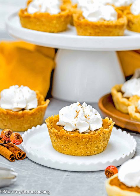 Eggless Mini Pumpkin Pies Eggless Pumpkin Pie Recipe, Eggless Pumpkin Pie, Desserts Without Eggs, Eggless Brownie Recipe, Baking Pan Sizes, Pumpkin Dump Cake Recipe, Spice Cake Mix And Pumpkin, Cake Pan Sizes, Easy Pumpkin Dessert