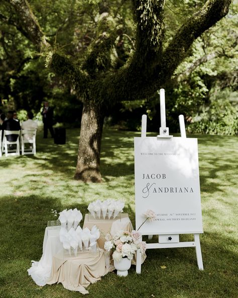 That petal toss moment after you say ‘I do’ is so iconic! We offer petal stations that sit perfectly next to your welcome sign to greet guests as they enter your ceremony space. The cones come in lots of 25- so you can choose how many you think you’ll need! Or maybe you don’t need any cones! You just want a big ol’ basket of delicate petals that guests can grab from- we can do that too! We can clean up the beautiful mess afterwards too 😉 Photography by @anelloweddings ✨ Flower Send Off Wedding, Petal Station Wedding, Petal Toss Station, Pedal Toss Wedding, Petal Toss Cones, Petals Down The Aisle, Petal Toss Wedding, Petal Cones, Petal Toss