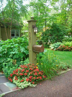 .Awwwwwwesome!!!! it's just amazing how a small item, as a mail box, can make such a dramatic difference in the curb appeal of your home!!!!!!!!!!!! Mailbox Garden, Mailbox Makeover, Mailbox Landscaping, Front Yards Curb Appeal, Diy Mailbox, Mailbox Ideas, Mailbox Design, Mail Boxes, House Landscaping