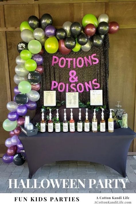 How I threw a Fun Kids Halloween Party with a Potions and Poisons Bar. We did a Halloween Movie Concession Stand all around Italian Soda Syrups. Checkout the Whole Blog Post. **** Cute, Not Scary Halloween Party Themes for Kids. Young Kids Party Ideas. Preschool Party, Kindergarten Classroom Party Ideas. October Birthday Party Ideas. Halloween Balloon Garland Pick Your Poison Game, Witch Birthday Party Games, Halloween Party Decor For Adults, Games For A Halloween Party, Halloween Party Stations, Halloween Themed Birthday Party Games, Halloween Party Prizes For Adults, Halloween Party For Adults Decoration, Witches Theme Party