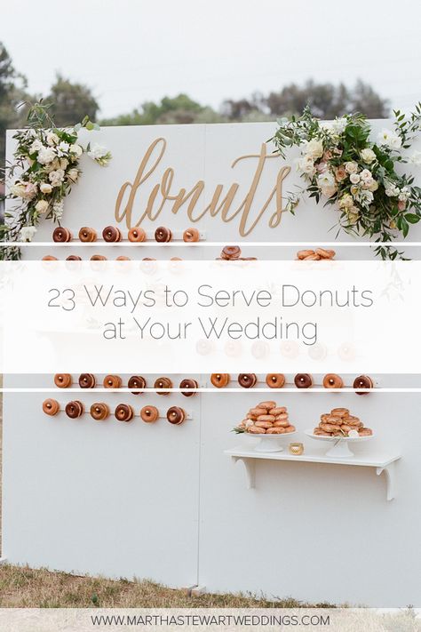 23 Ways to Serve Donuts at Your Wedding That Your Guests Will Love! These fun reception desserts are a creative alternative to classic wedding cake. #WeddingIdeas #WeddingFood #WddingDonuts #FunWeddingFood | Martha Stewart Weddings - 23 Delicious Ways to Serve Donuts at Your Wedding Doughnut Dessert Table Wedding, Donut Wall For Wedding Reception, Donuts Wall Wedding, Donut Reception Ideas, Donuts Instead Of Wedding Cake, Doughnut Wedding Cakes, Doughnuts At Wedding, Donut Stack Wedding, Donut Ideas For Wedding