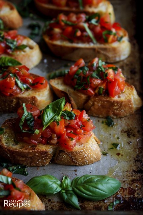 Classic Bruschetta is a traditional Italian appetizer that features toasted bread topped with a fresh mixture of tomatoes, garlic, basil, and olive oil. Tartufo Recipe, Italian Appetizer Recipes, Italian Bruschetta Recipe, Italian Hot Chocolate Recipe, Classic Bruschetta, Homemade Italian Meatballs, Italian Bruschetta, Italian Main Dishes, Italian Snacks