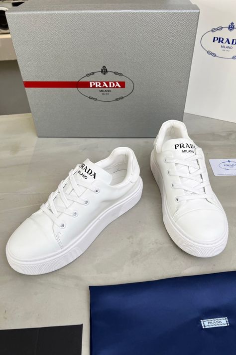 White designer sneakers | Prada White Sneakers | Newest Collection of Luxury sneakers High-end footwear | Fashion sneakers | Trendy white Sneakers | Stylish sneakers | Designer shoes for men & women Trendy White Sneakers, Sneakers Trendy, Designer Shoes For Men, Footwear Fashion, Mens Designer Shoes, Royal Outfits, Green Sneakers, Luxury Sneakers, Sneaker Collection