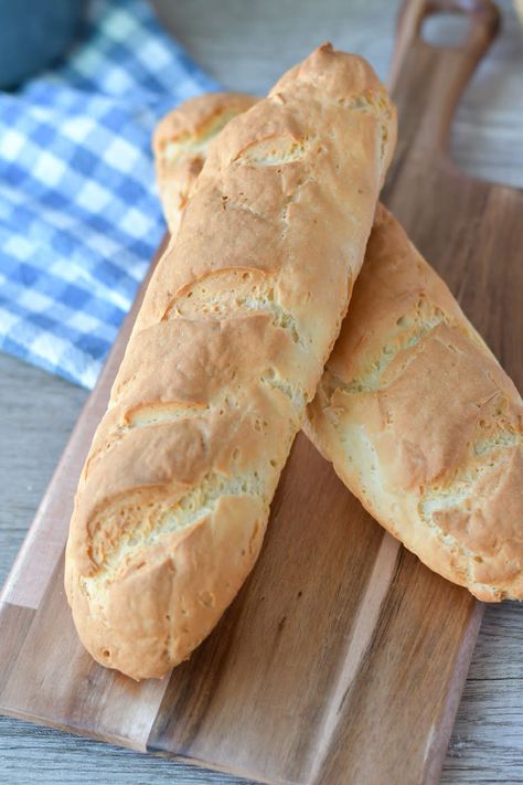 You'll love how easy it is to make this gluten-free French bread. It features a beautiful golden crust with a fluffy inside, filled with the perfect amount of airy bubbles to hold butter. This recipe is sure to become your family's go-to for a fresh, delicious loaf of gluten-free bread. Gluten Free Sourdough French Bread, Gluten Free Peasant Bread Recipe, Homemade Bread Gluten Free, Gf French Bread, Bob Mills Gluten Free Flour Recipes, Gluten Free French Bread Recipe, Loopy Whisk Gluten Free Bread, Gluten Free Garlic Bread Easy, Bread Maker Gluten Free Bread Recipe