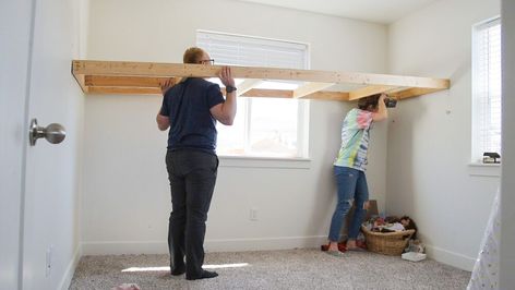 Are you struggling with the small bedroom blues like we were? We needed to figure out how to comfortably fit our two girls into a small bedroom, and I think you might be interested to find out how we solved our space issue. Before, we tried out this loft bed from Amazon, but it just didn't work well and took up too much floor space. I came to the conclusion that the only way to get the most out of this space, was to customize a loft bed for the bedroom. First, we measured the total Diy Loft Twin Bed, Diy Simple Loft Bed, Loft Bed Over Window, Play Loft Over Bed, Loft Bedroom Low Ceiling, Built In Loft Bed Ideas, Diy Loft Bed For Teens, Built In Loft Bed, Bed Inside Closet Ideas