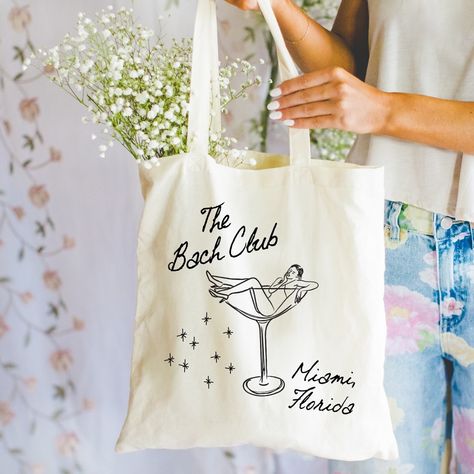 The Bach Club - Vintage Doodle Inspired Tote Bag for Bachelorette Parties, Wedding Gift Bags, Birthday parties, Family reunions, etc! Hit your girl up for all your custom merch needs for the summer!!! Trendy Party Tote Bag, Event Merch, Bridal Tote Bags, Bach Party Totes, Bachelorette Jute Bags, Gift Bags Birthday, Custom Merch, Bridal Party Tote Bags, Wedding Gift Bags