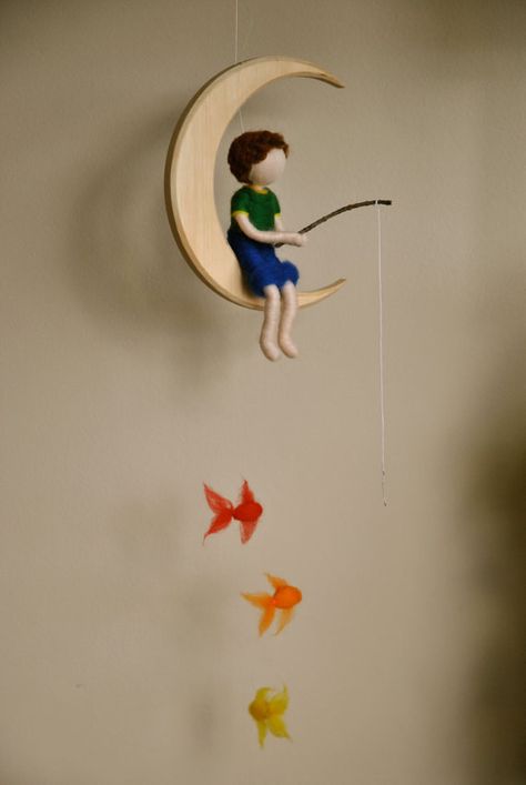 The fishing boy in the moon mobile. | 27 Amazing Etsy Finds Your Kid Needs Right Now Boy Mobile, Waldorf Crafts, Felt Fairy, Felt Mobile, In The Moon, Hanging Mobile, Waldorf Inspired, Waldorf Dolls, Baby Diy