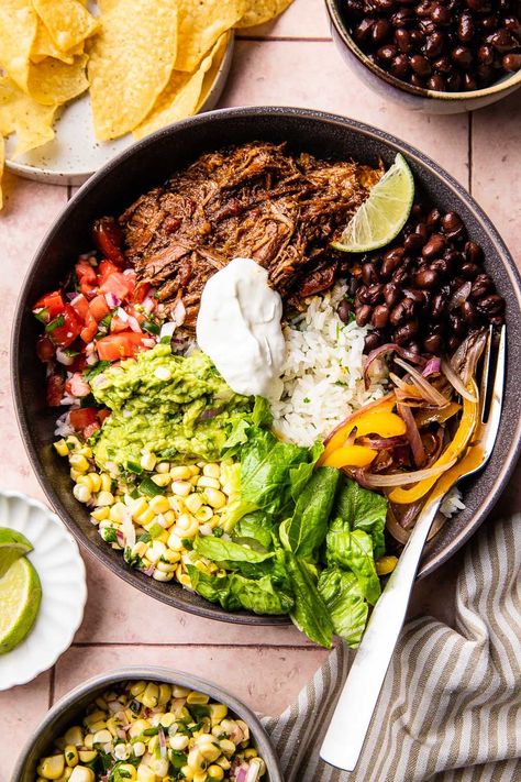 Chipotle Beef Burrito Bowls are a better copycat of your favorite chipotle bowl! Tender shredded beef over rice with all the best toppings. Chipotle Beef Burrito Bowl, Shredded Beef Burrito Bowl, Beef Chipotle Bowl, Beef Burittos Bowl Recipes, Pulled Beef Burritos, Shredded Beef Bowls Healthy, Healthy Chipotle Bowl At Home, Chipotle Beef Bowl Recipe, Burrito Bowl Beef