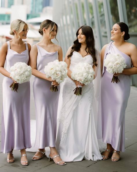 💜 Lilac, violet, or mauve... 💃 Purple bridesmaid dresses are one of the hottest bridesmaids dress trends this year! Purple is versatile and perfect for injecting a punch of colour or a splash of romance to your day. ✨ Click the link in our bio for 25 styling ideas to get inspired: https://onefabday.com/purple-bridesmaid-dresses/ Photo 1: @aarondelesie Photo 2: @annagphotography_ Photo 3: @jenhuangbogan Photo 4: @milkhoneycreative Photo 5: @elizabethsellersphoto Photo 6: @janawilliamsp... Lilac Bridesmaid Satin Dresses, Grey Purple Bridesmaid Dresses, Bridesmaid Dresses Lavender Silk, Maid Of Honor Dress Lavender, Bridesmaid Dresses Violet, Lavender Purple Bridesmaid Dresses, Lavender Satin Bridesmaid Dresses, Lavender Bridesmaids Dresses, Lilac Satin Bridesmaid Dresses