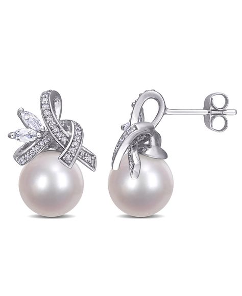 These stunning ribbon drop earrings are crafted in lustrous 10-karat white gold and feature gorgeous cultured freshwater pearls paired with marquise-cut white topaz stones and glistening diamonds in a unique ribbon design. Instantly add a touch of elegance and class to any ensemble with these stunning earrings. Pearl Ribbon, White Topaz Earrings, Diamond Ribbon, Pearl And Diamond Earrings, Peoples Jewellers, Topaz Earrings, Pearl Types, Freshwater Cultured Pearls, Stunning Earrings