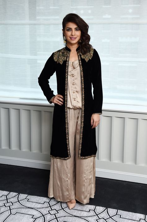 At the Bajirao Mastani New York press junket.   - ELLE.com Long Net Shrug Design, Net Shrug Design, Net Shrug, Shrug Design, Embellished Coat, Shrug For Dresses, Mode Kimono, Velvet Dress Designs, Diana Penty