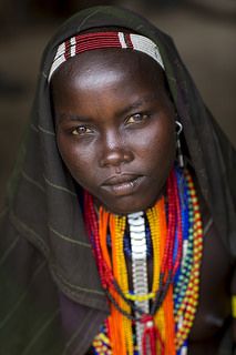 Miss Baro Tula, an Erbore girl, south Ethiopia. She is shaved as she is virgin, and in one year, at 18, she' ll marry a man she knows but she did not choose. The parents chose him. She has a boyfriend she' ll have to forget once married. She will be genitaly mutilated... © Eric Lafforgue Eric Lafforgue, Steve Mccurry, Tribe Of Judah, African People, We Are The World, African History, World Cultures, African Culture, People Of The World